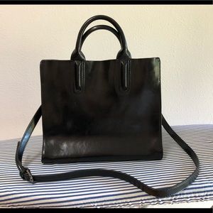 Black leather tote bag.